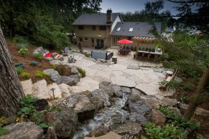 stunning waterfall stone hardscape design